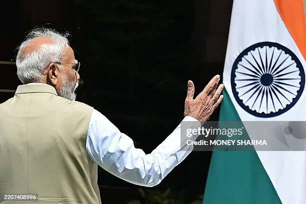 Indian Prime Minister Narendra Modi gestures before his meeting with Chilean President Gabriel Boric Font, at the Hyderabad House in New Delhi on...