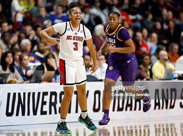 Zamareya Jones of the NC State Wolfpack celebrates after making a shot in the second quarter against the LSU Lady Tigers in the Sweet Sixteen round...