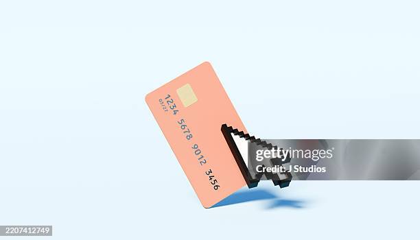 digital transactions: oversized cursor on credit card - credit card art stock pictures, royalty-free photos & images