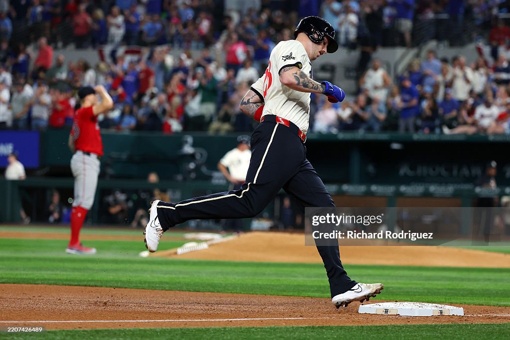 Texas Ranger Heim Jonah Heim of the Texas Rangers runs the bases after a home run in ...