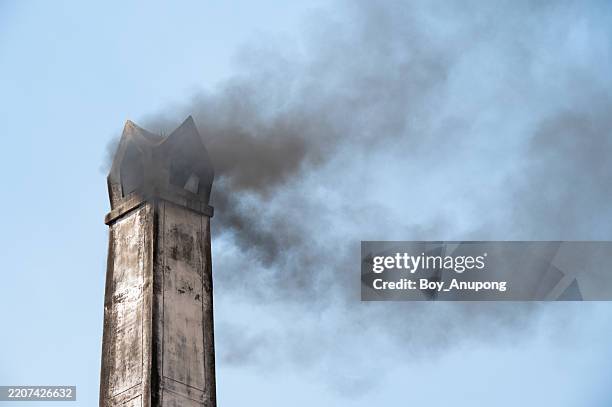 smoke from a crematorium chimney. crematory or cremation center is a venue for the cremation of the dead. - feuerbestattung stock-fotos und bilder