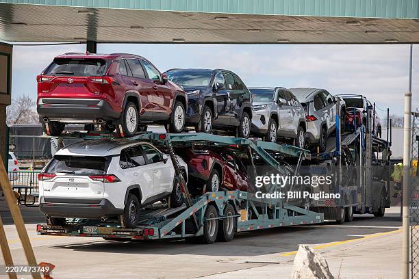 Car hauler truck gasses up at a duty-free station before crossing the Ambassador into the United States at Detroit on April 1, 2025 in Windsor,...
