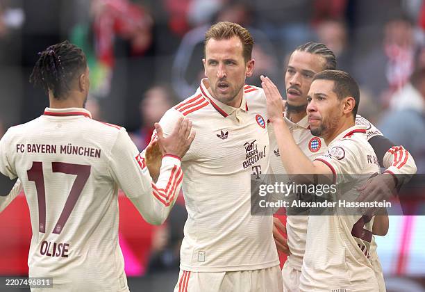 Leroy Sane of Bayern Munich celebrates scoring his team's second goal with teammates Michael Olise, Harry Kane and Raphael Guerreiro during the...