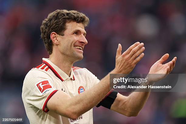 Thomas Mueller of Bayern Munich applauds the fans after the Bundesliga match between FC Bayern München and FC St. Pauli 1910 at Allianz Arena on...