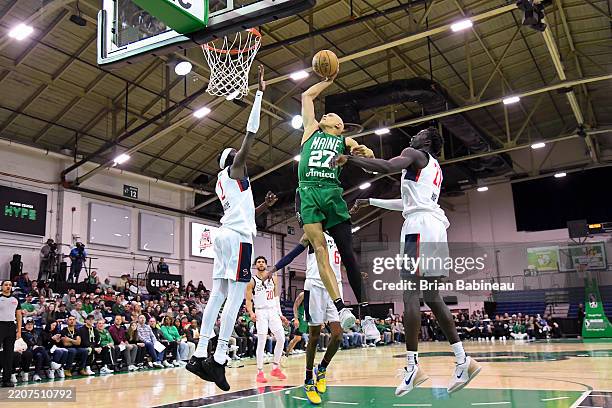 Jordan Walsh of the Maine Celtics dunks the ball during the game against the Capital City Go-Go during the G League Conference Quarter Finals on...