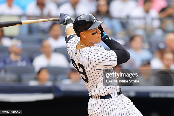 Aaron Judge of the New York Yankees hits a two run home run in the fourth inning against the Milwaukee Brewers at Yankee Stadium on March 29, 2025 in...