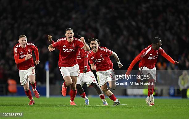 Elliot Anderson, Nikola Milenkovic, Jota Silva and Callum Hudson-Odoi of Nottingham Forest celebrate following the team's victory in the penalty...