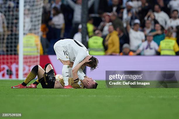 Madrid, Spain Luka Modric of Real Madrid CF and Luka Sucic of Real Sociedad gestures during the Copa del Rey semifinal match between Real Madrid and...