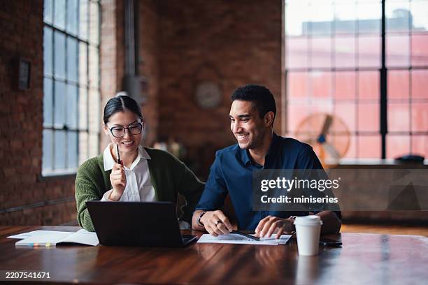 team collaboration in a modern office environment - computer pov stock pictures, royalty-free photos & images