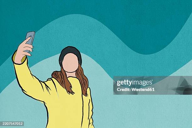 young woman in winter attire taking a selfie with smartphone against abstract background - selfie stock illustrations