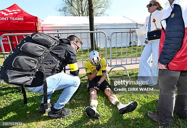 Team Visma-Lease a Bike's Belgian rider Wout van Aert reacts at the end of the men's elite race 'Dwars Door Vlaanderen' 2 km from Roeselare to...