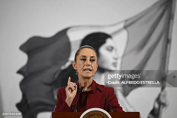 Mexico's President Claudia Sheinbaum gestures as she delivers her daily press conference at Palacio Nacional in Mexico City on April 2, 2025.