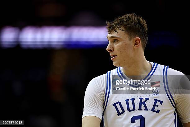 Cooper Flagg of the Duke Blue Devils looks on against the Alabama Crimson Tide during the second half in the East Regional Elite Eight round of the...