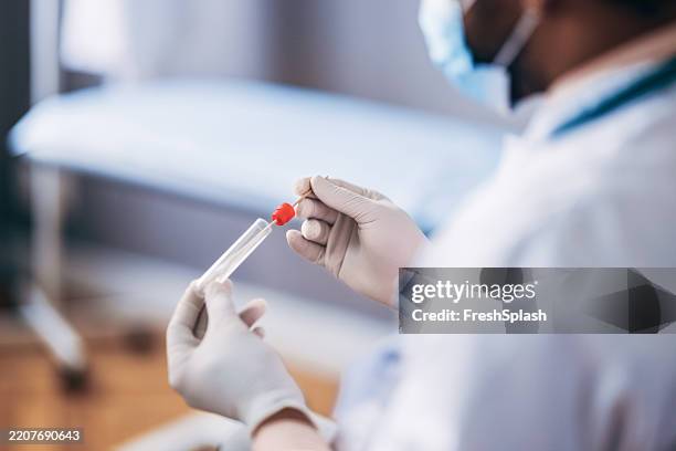 Handling Lab Sample 82 Specimen Handling Stock Photos, High-Res Pictures, and Images ...
