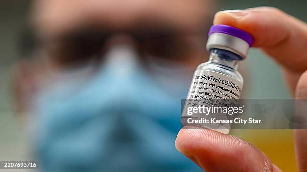 Dose of COVID-19 vaccine during a vaccination clinic in the Kansas City area.