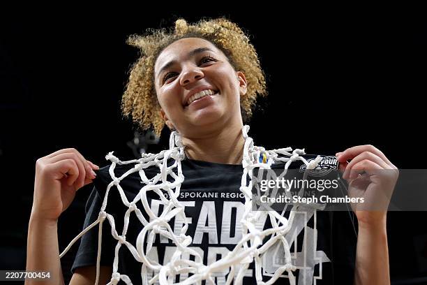 Kiki Rice of the UCLA Bruins celebrates after winning the Spokane regional championship against the LSU Lady Tigers 72-65 in the Elite Eight round of...