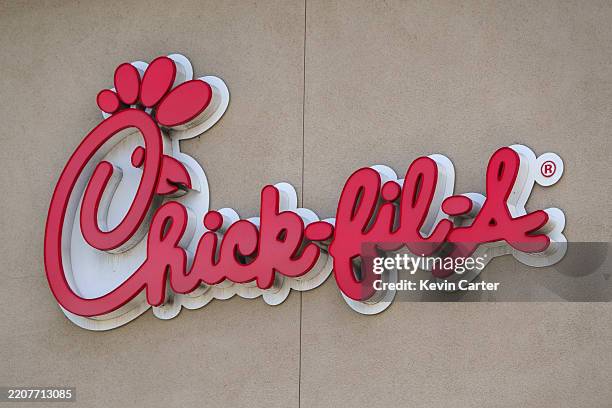Chick-fil-A logo is displayed outside one of their restaurants on March 23, 2025 in San Diego, California.