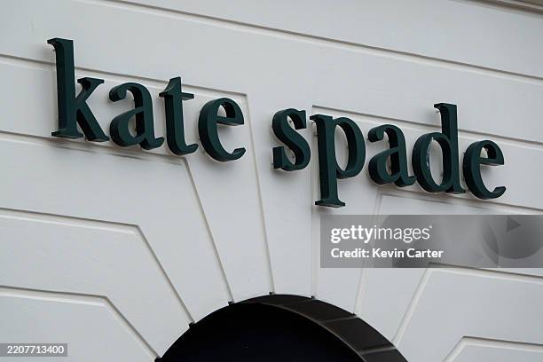 Kate Spade logo is displayed outside one of their stores on March 23, 2025 in San Diego, California.