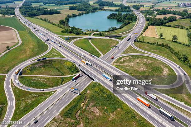 aerial view of highway intersection - motorway junction stock pictures, royalty-free photos & images