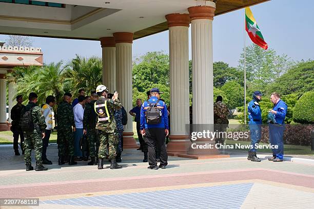 Rescue teams from other countries gather at Naypyidaw International Airport on March 30, 2025 in Naypyidaw, Myanmar. Rescue teams from countries and...
