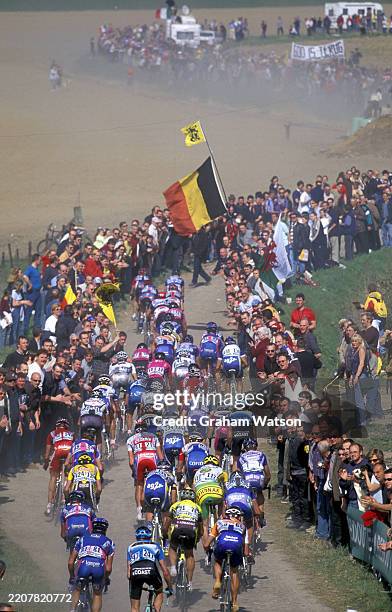 The peloton enters a section of cobblestones in the 2003 Paris-Roubaix.