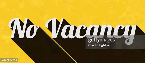 no vacancy - text with long shadow on textured yellow background - no vacancy stock illustrations
