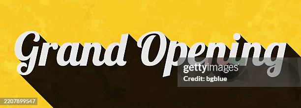 grand opening - text with long shadow on textured yellow background - opening ceremony stock illustrations