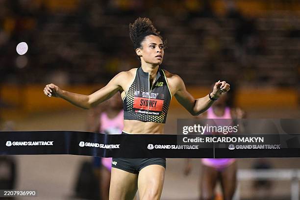 S Sydney McLaughlin-Levrone of team New Balance crosses the finish line in first place in the women's 400 meter long hurdles during the Grand Slam...