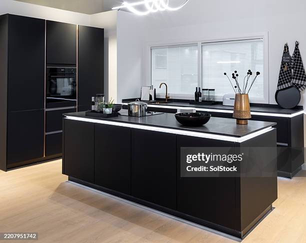 trendy modern kitchen - kitchen island stock pictures, royalty-free photos & images