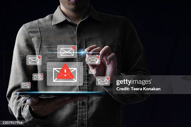 cybercrime security concepts email-transmitted viruses hand using laptop show malware screen attach from email. - security alert stock pictures, royalty-free photos & images