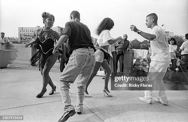 Couples compete in a dance contest on the steps of the Bronx County Courthouse in the Bronx in 1992.