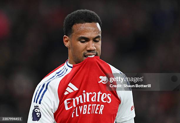 Gabriel of Arsenal looks dejected as he leaves the pitch after picking up an injury during the Premier League match between Arsenal FC and Fulham FC...