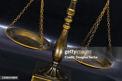 Libra scale representing justice system Libra scale representing justice system