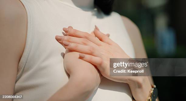 asian woman breathing inhaling good air - sighing stock pictures, royalty-free photos & images