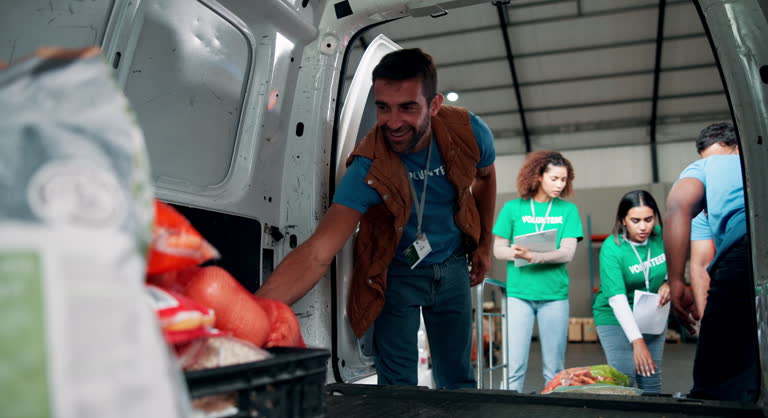 https://media.gettyimages.com/id/2208112195/video/aid-food-drive-and-van-with-volunteer-people-unpacking-donations-for-community-outreach.jpg?b=1&s=640x640&k=20&c=GUI4awfJnoj714aJnvaNIs9XP_TLnMuuddFplFXLamc=