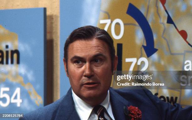 Close-up of weather forecaster Willard Scott in front of a weather map on the 'Today Show' set at NBC Studios, New York, New York, June 1980.