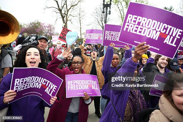 Abortion rights protestors demonstrate outside the U.S. Supreme Court as oral arguments are delivered in the case of Medina v. Planned Parenthood...