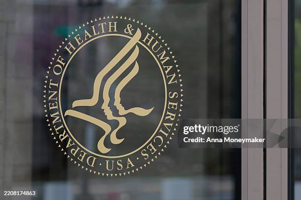 Signage for the Department of Health and Human Services headquarters is seen on April 02, 2025 in Washington, DC. Layoffs began earlier this week at...
