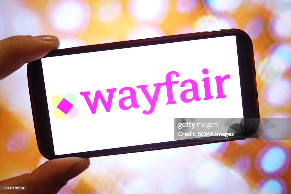In this photo illustration, the Wayfair company logo is seen...