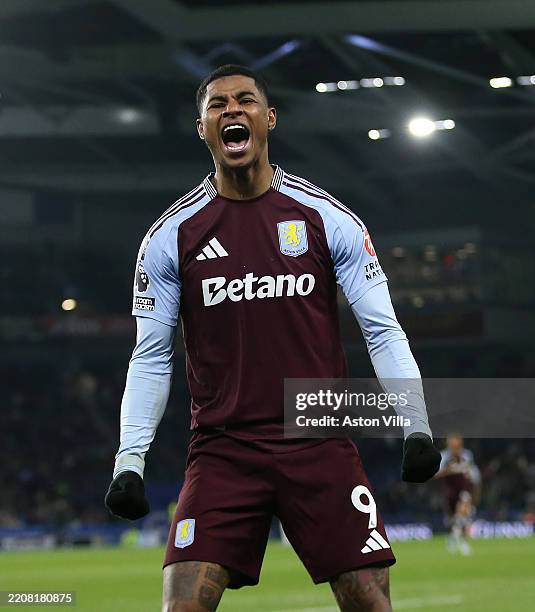 Marcus Rashford of Aston Villa celebrates scoring his team's first goal during the Premier League match between Brighton & Hove Albion FC and Aston...