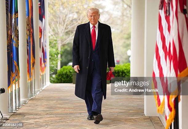 President Donald Trump arrives to speak during a “Make America Wealthy Again” trade announcement event in the Rose Garden at the White House on April...