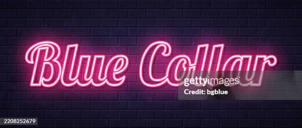 blue collar - glowing neon text on brick wall background - common blue violet stock illustrations