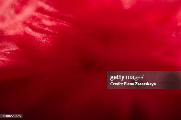 abstract close-up of vivid red texture with soft light effects - desire stock pictures, royalty-free photos & images