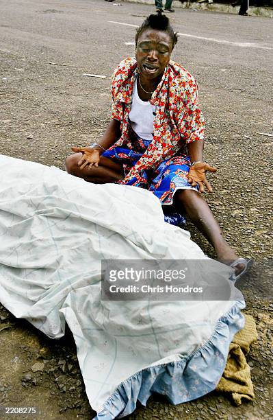 shelling continues in monrovia - horror of war stock pictures, royalty-free photos & images