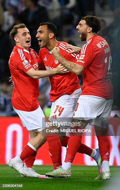 Benfica's Greek forward Vangelis Pavlidis celebrates scoring the opening goal during the Portuguese League football match between FC Porto and SL...