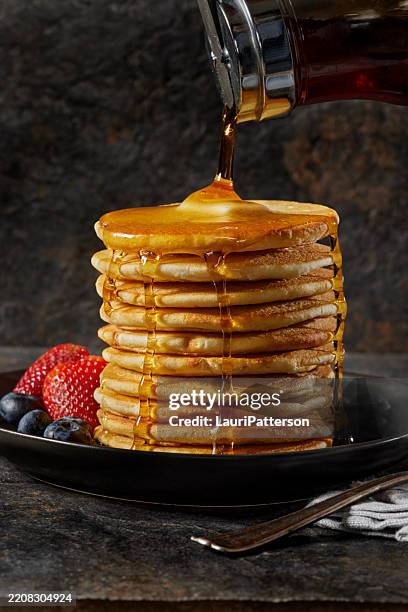 tall stack of toaster pancakes - syrup stock pictures, royalty-free photos & images