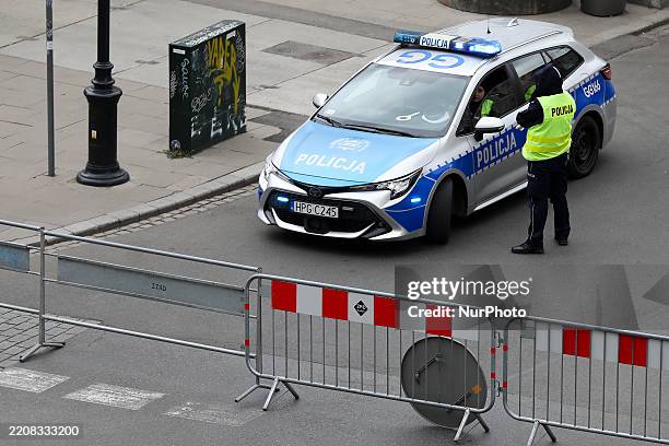 Police are present during the TAURON 22nd Cracovia Marathon on the streets of the city in Krakow, Poland, on April 6, 2025. Organized since 2002, the...