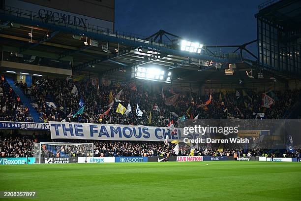 General view as fans of Chelsea wave flags and display a banner reading THE FAMOUS CHELSEA prior to the Premier League match between Chelsea FC and...
