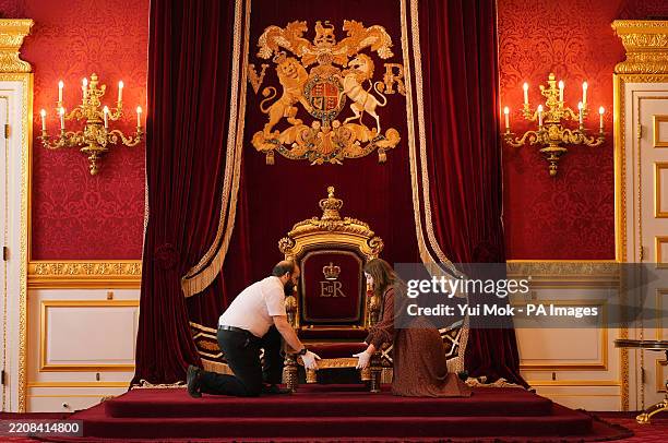 Collections Management Assistants make final preparations in the Throne Room, which contains the throne chair, attributed to Bailey & Sanders, c....