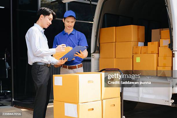 Asian Courier Delivering Package to man Delivery service near van outside the warehouse, delivery home